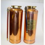 Two polished copper & brass fire extinguishers