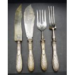 Four German silver handle serving utenslis