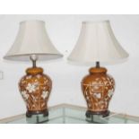 Pair of oriental pottery based electric lamps