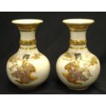 Pair Satsuma Japan decorated ceramic table vases