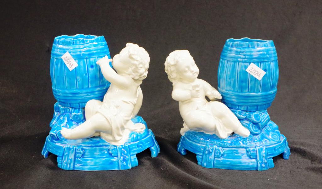 Pair Victorian Royal Worcester cupid vases