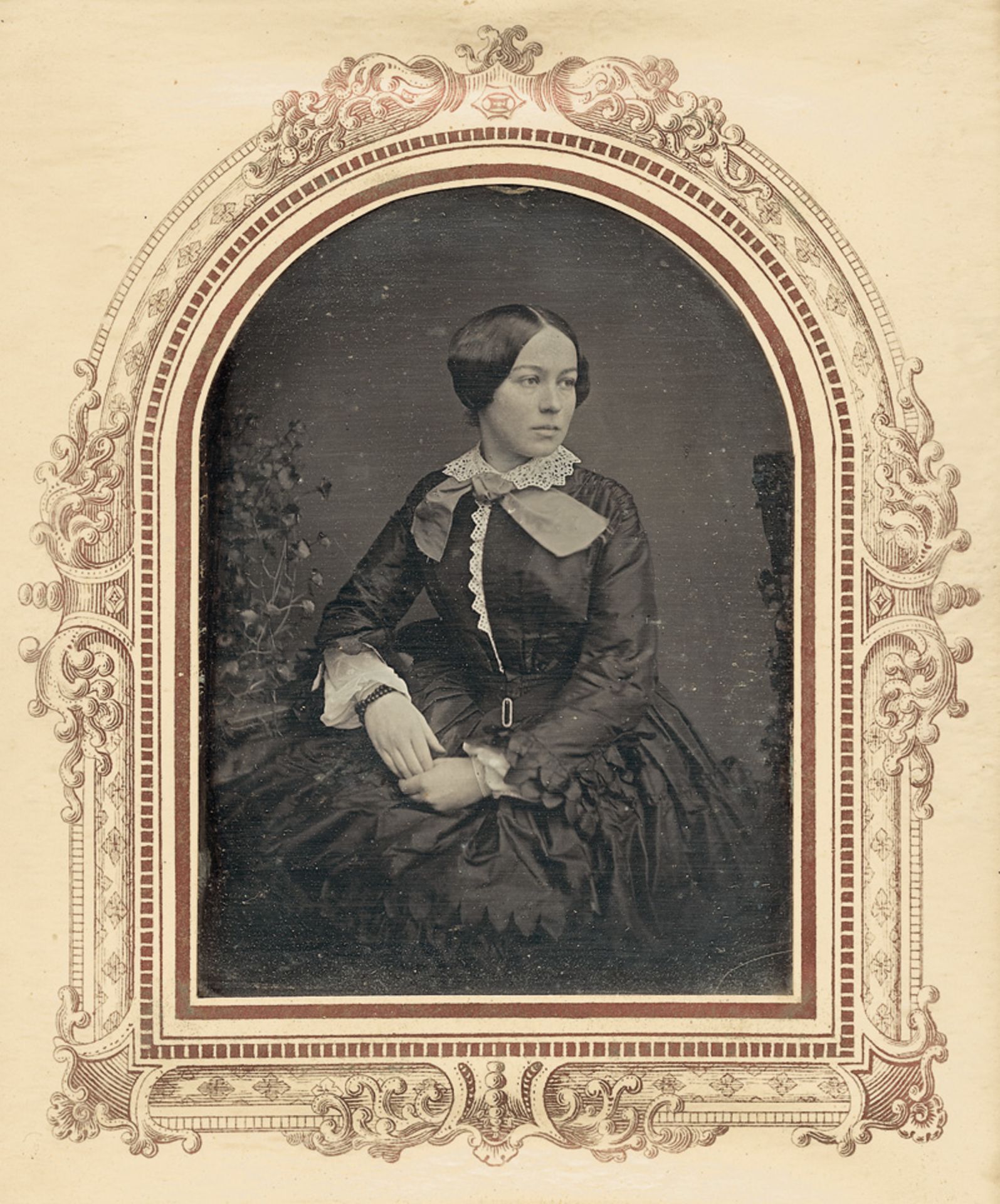 Daguerreotype: Portrait of a finely dressed woman