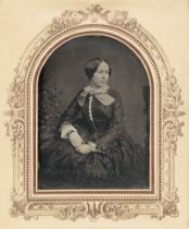 Daguerreotype: Portrait of a finely dressed woman