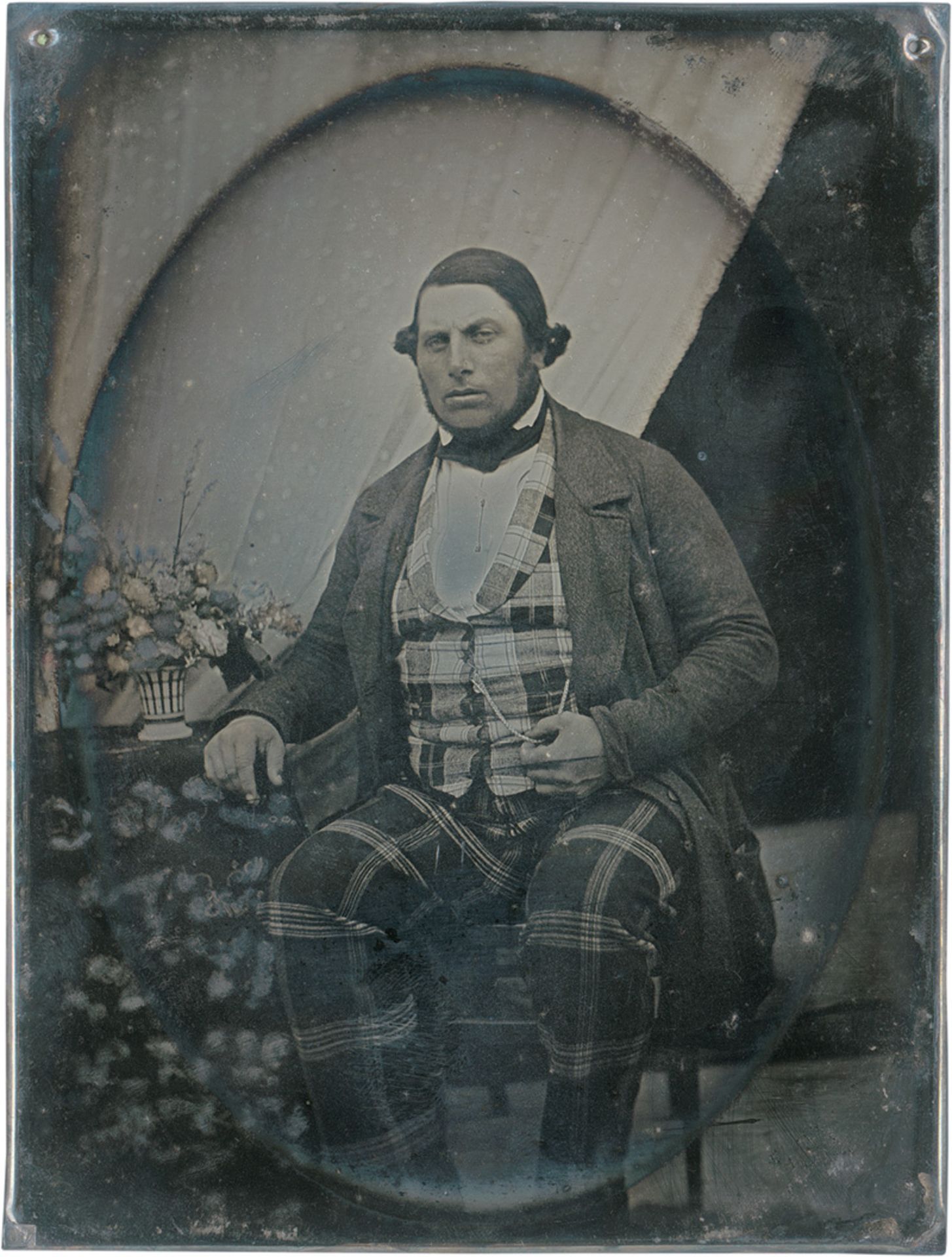 Daguerreotype: Portrait of a man in plaid suit