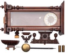 A Vienna-style regulator walnut and glazed wall clock the eight-day duration,