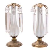 A pair of Regency gilt-metal and glass hung lustre candlesticks,