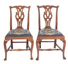 A pair of late George II or George III walnut side chairs in Chippendale taste,