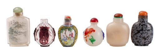 A set of six Chinese glass, hardstone and enamel snuff bottles and stoppers,