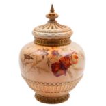 A Royal Worcester porcelain pot pourri vase and covers,