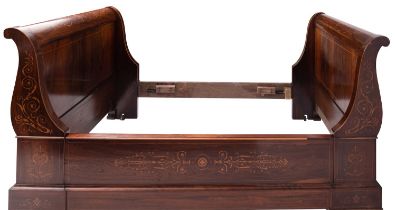 A rosewood and marquetry lit en bateau,