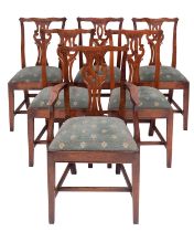 A set of six stained hardwood dining chairs in George III Chippendale taste,