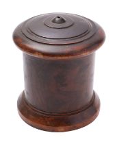 A Victorian lignum vitae string barrel, mid 19th century; of cylindrical form,