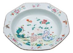 A Chinese famille rose octagonal deep dish/basin painted with a fenced garden with cranes,