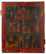 A Russian painted wood icon, 19th century; depicting scenes from the lives of Saints,