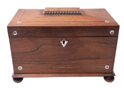 A Regency Rosewood and line inlaid tea caddy, circa 1815; of sarcophagus form,