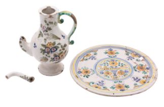 An Italian maiolica tazza and a similar coffee pot the tazza inscribed 'S.M.