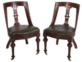 A pair of Victorian mahogany side chairs in Aesthetic style,