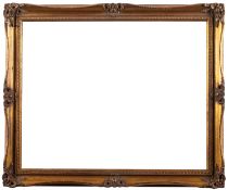 Two wood and gesso gilt picture frames with openwork Rocaille decoration,