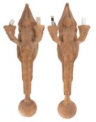 A pair of painted plaster twin light figural wall appliques, in Art Deco style,