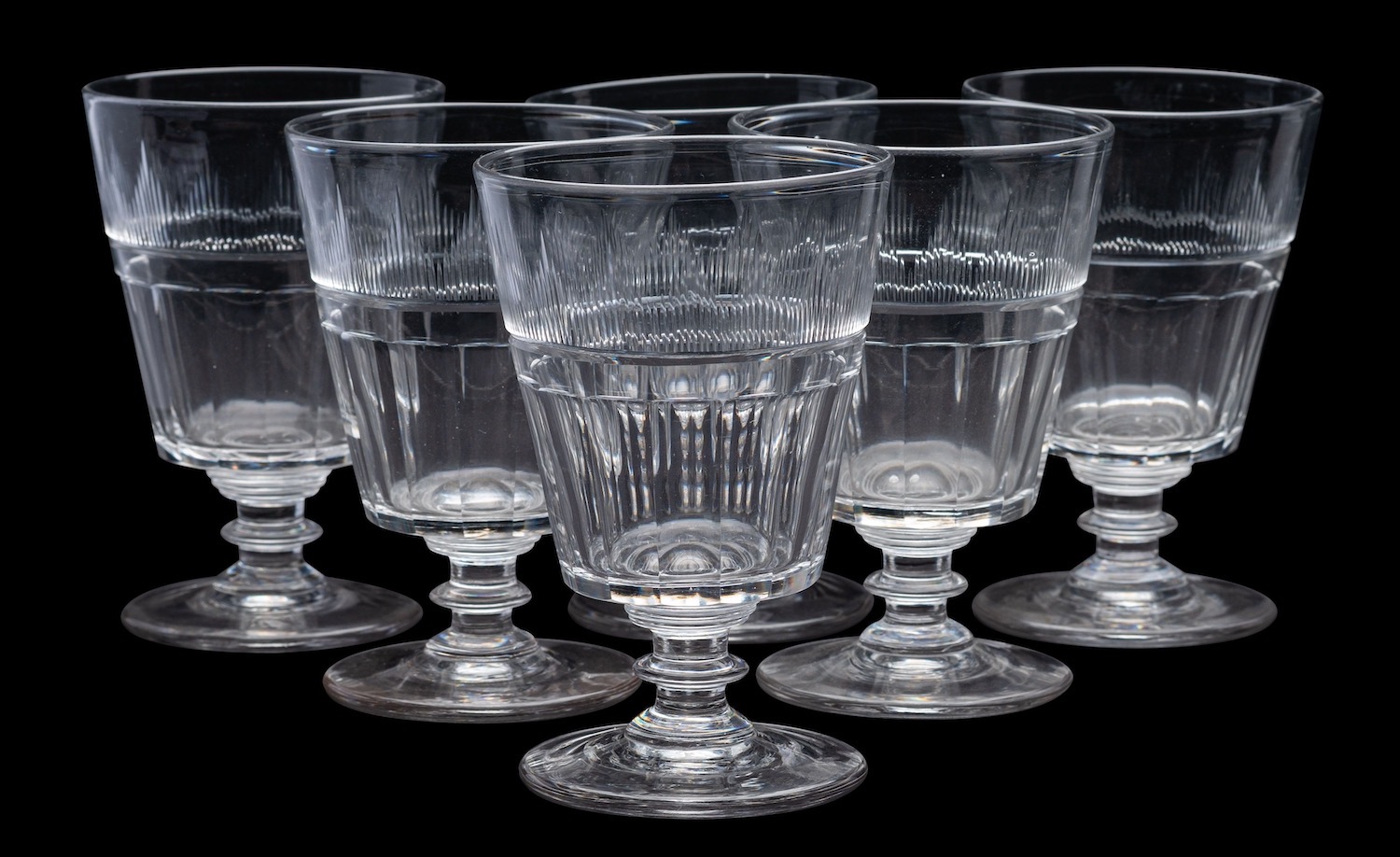 A set of six mid 19th century glass rummers with blaze and slice cut bucket bowls and on knopped