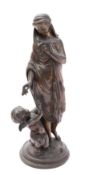 A Continental bronze group of a maiden with Cupid,