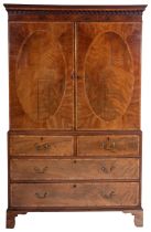 A George III mahogany and crossbanded linen press,