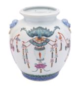 A Chinese famille rose 'auspicious objects' jar of ovoid form with rolled rim and lion-dog ring