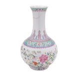 A Chinese famille rose bottle vase painted with peony,