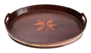 A George III mahogany and parquetry oval tray, with central stellar motif,