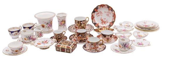 A collection of Royal Crown Derby porcelain, comprising tea wares, a vase, strainer,