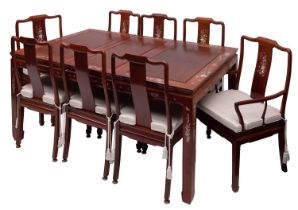 A South East Asian hardwood and mother-of-pearl inset extending dining table,