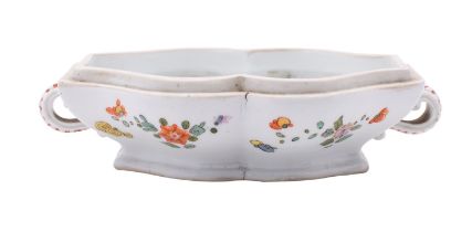 A Meissen two-handled box of cartouche form,