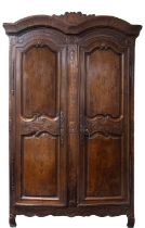 A Louis XV chestnut armoire,