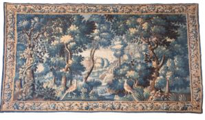 A Flemish verdure tapestry, 18th century; depicting birds in a dense wood,