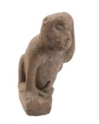 A sculpted limestone model of a monkey,