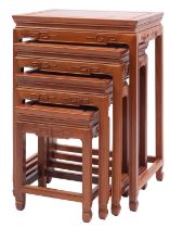 A nest of four Chinese stained hardwood occasional tables,