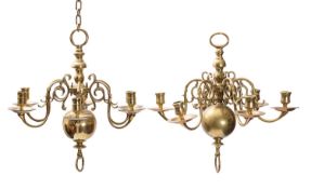 A matched pair of Dutch brass six light chandeliers in late 17th /early 18th century style,