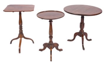 A George III oak circular tripod table, late 18th century, with baluster turned stem, 70cm high,