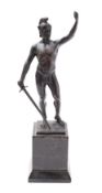 A Continental patinated bronze model of a warrior,