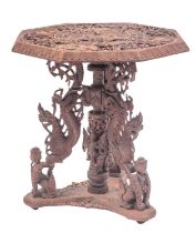 A South East Asian, probably Burmese carved and stained hardwood occasional table,