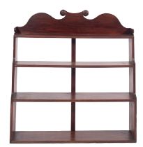 A Regency simulated rosewood hanging waterfall bookcase,