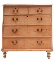 A Victorian pine chest of drawers, late 19th century; the top with ovolo moulded edges,