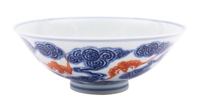 A Chinese blue and iron-red 'Bats' bowl the exterior decorated with five iron-red bats amongst