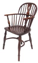 An early Victorian elm and ash Windsor armchair, by Moss of Worksop,