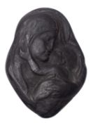 Alfred Lyndhurst Pocock (1882-1962), a carved ebony relief of the Madonna and Child,