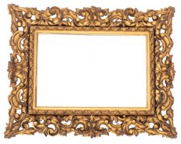 An Italian carved and giltwood framed wall mirror in the 18th century style,