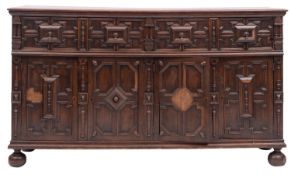 An oak side cupboard or dresser base in William and Mary style,