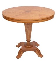 A maple and parquetry centre table in Biedermaier taste,