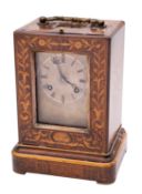 An early-Victorian French inlaid rosewood campaign clock having an eight-day duration movement