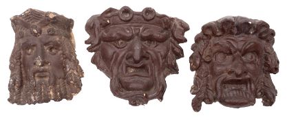 Three painted plaster masks in the manner of Thomas Hope,